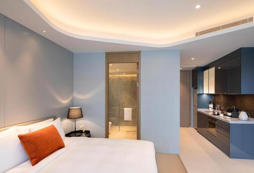 Escritório Standard Vista Jardim, Oakwood Apartments Sanya