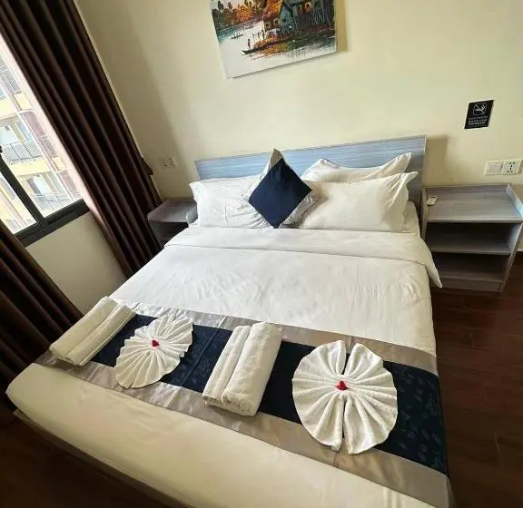 キングサイズベッドのデラックスルーム, City Comfort Airport Hotel Phnom Penh