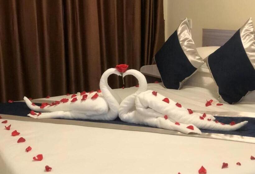 キングサイズベッドのデラックスルーム, City Comfort Airport Hotel Phnom Penh