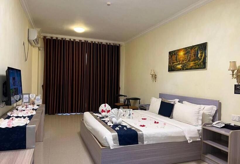 キングサイズベッドのエクゼクティブルーム, City Comfort Airport Hotel Phnom Penh
