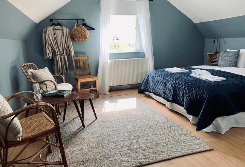 غرفة سوبيريور, Eksgården