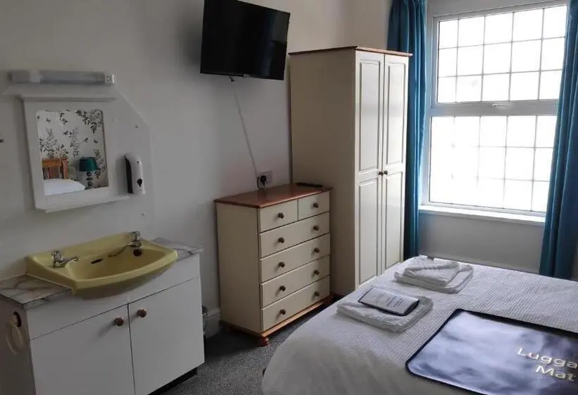 バスルーム共有のトリプルスタンダード, Elnor Guest House