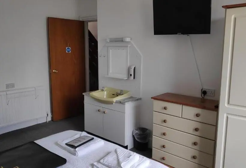 バスルーム共有のトリプルスタンダード, Elnor Guest House