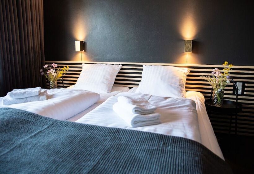 غرفة قياسية, B