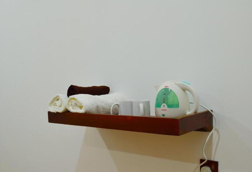 חדר דלוקס לשלושה, Monarch Residence