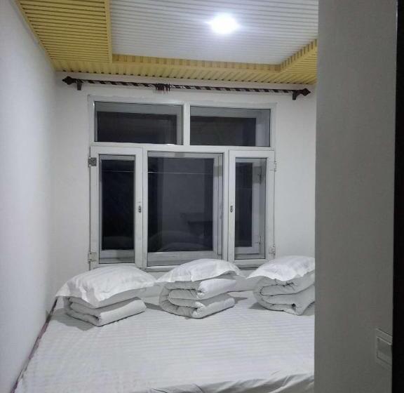 Quarto Triplo Standart, Xiaoguo Travellers  Home