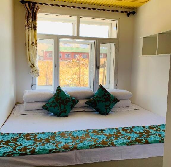 Quarto Triplo Standart, Xiaoguo Travellers  Home