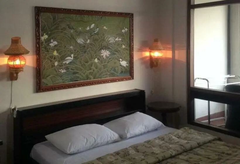 اتاق استاندارد با بالکن و چشم‌انداز دریا, Dewa Bharata Bungalows Candidasa
