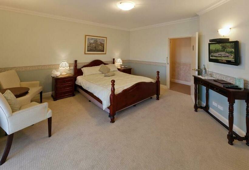 غرفة ديلوكس سرير ملكى, Plumes Boutique Bed & Breakfast