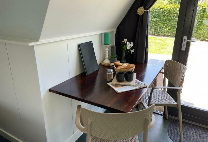 Номер Стандарт, Huisjes Oosterleek