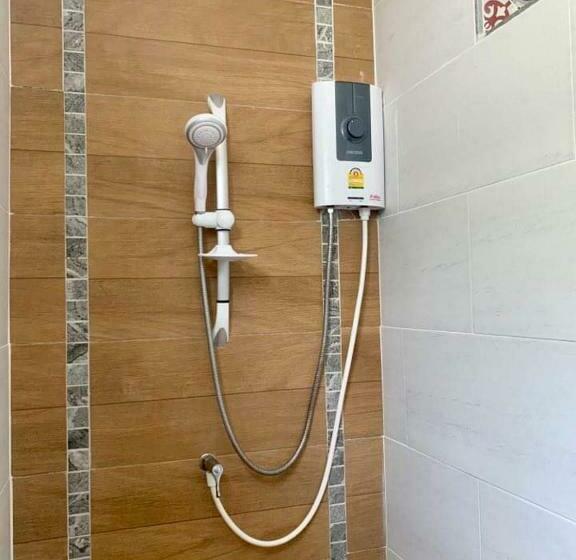 חדר סטנדרט לשלושה עם מרפסת, Tan Residence