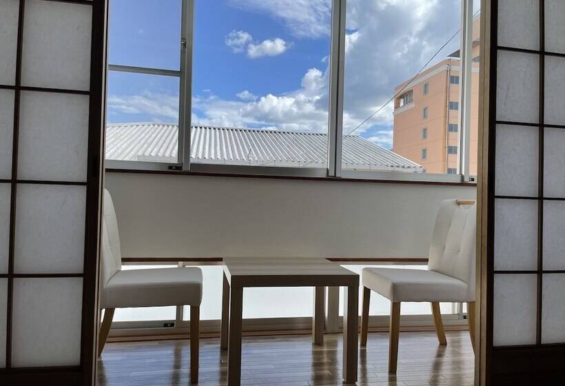 חדר סטנדרט לשלושה עם חדר אמבטיה משוף, Guesthouse Sunline Beppu