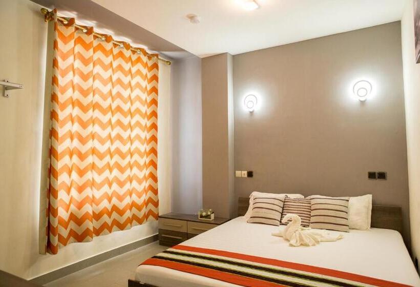 آپارتمان 2 خوابه, Imolease Kouessi Menontin