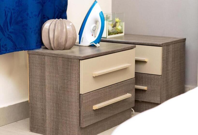 آپارتمان 2 خوابه, Imolease Kouessi Menontin