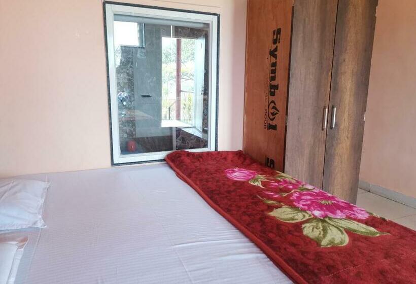 Quarto Quadruple Standart Vista Jardim, Shivshrushti Agro Tourism & River Camp Tapola