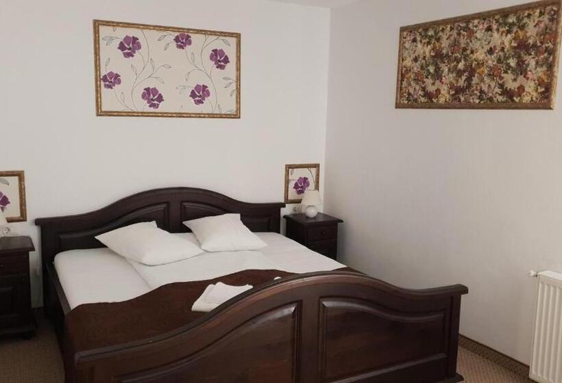 غرفة عائلية, Popasul Regelui Transalpina