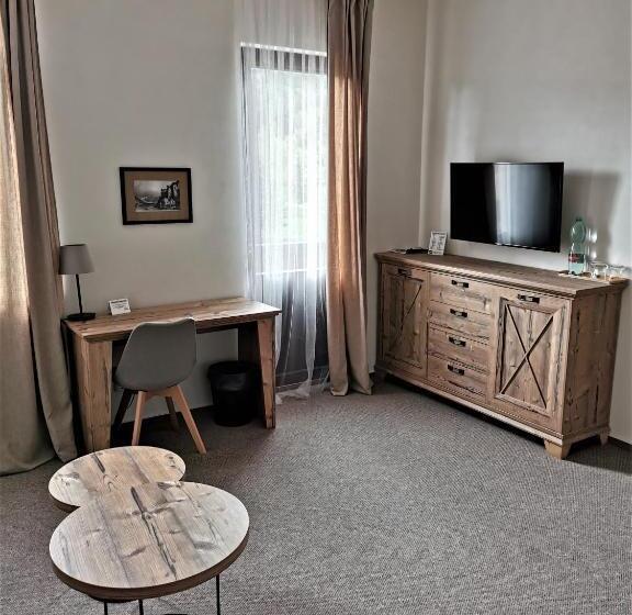 סוויטה עם מרפסת, švýcarský Dům