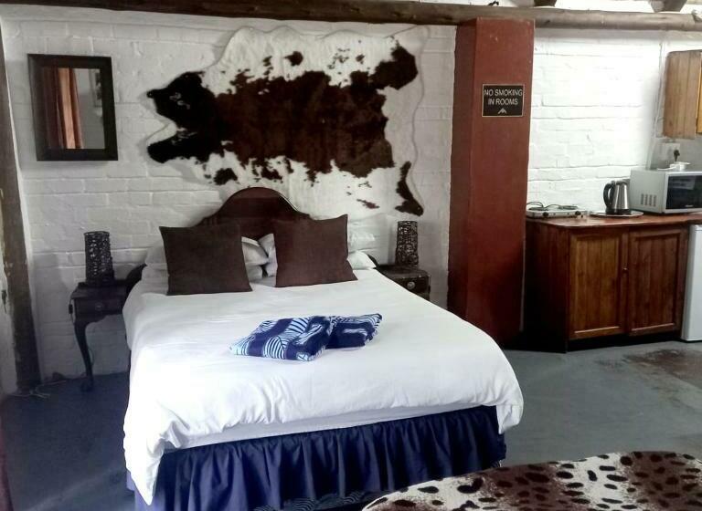 スタンダードスタジオ, Schweizer Guesthouse