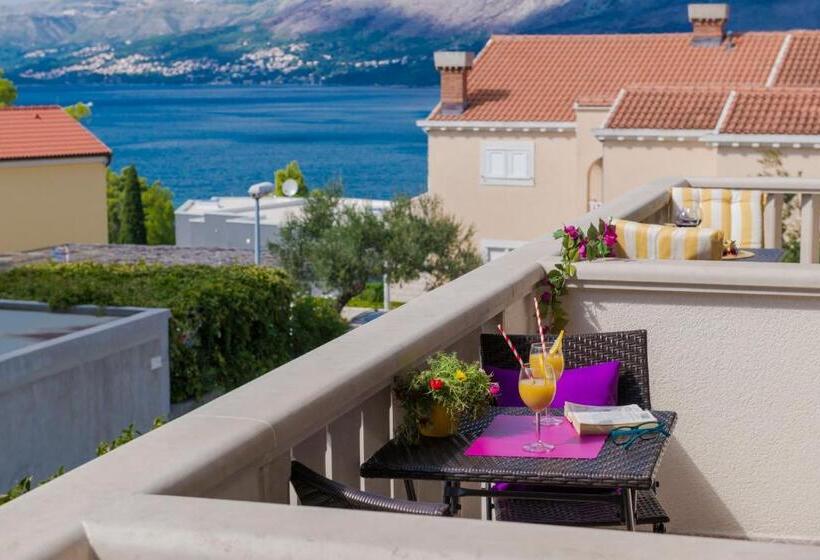 베이직 스튜디오, Cina Apartments