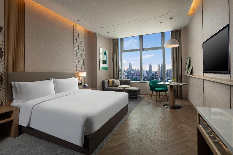 キングサイズベッドのスタンダードルーム, Holiday Inn Wuxi Central Station, An Ihg