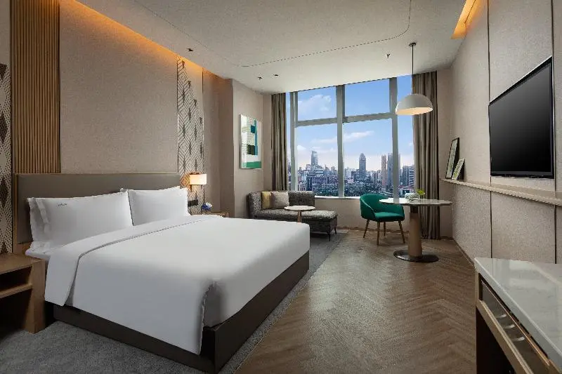 キングサイズベッドのスタンダードルーム, Holiday Inn Wuxi Central Station, An Ihg