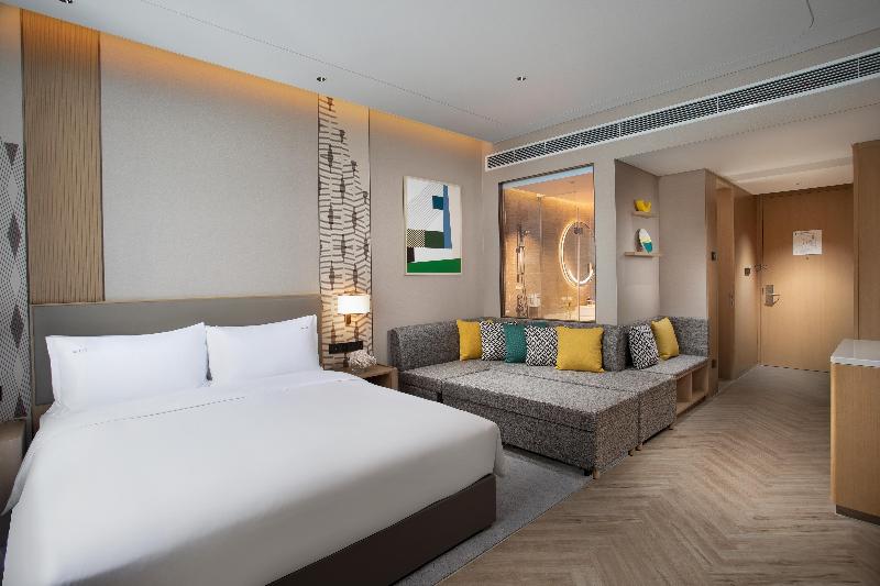 キングサイズベッドのスタンダードルーム, Holiday Inn Wuxi Central Station, An Ihg