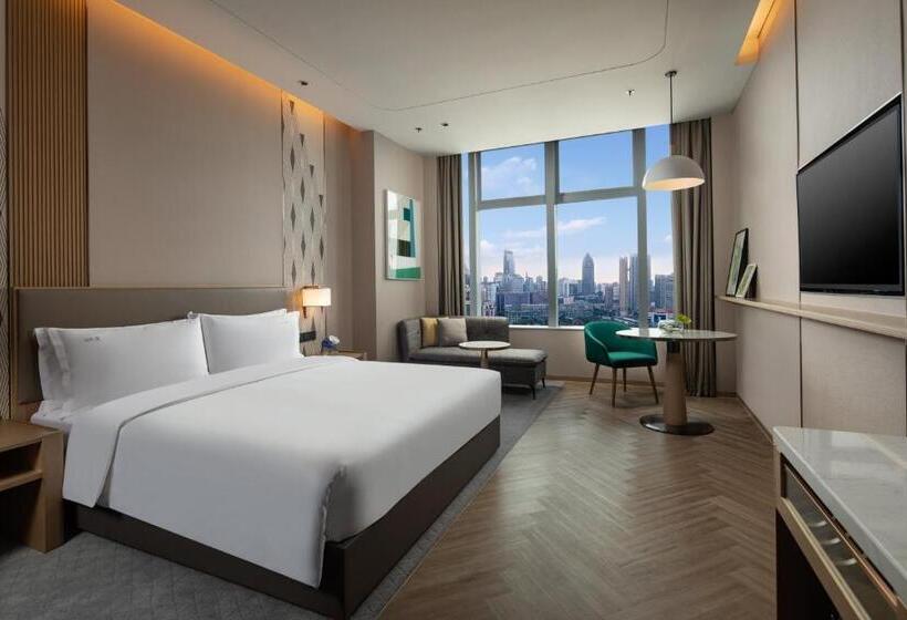 キングサイズベッドのスタンダードルーム, Holiday Inn Wuxi Central Station, An Ihg