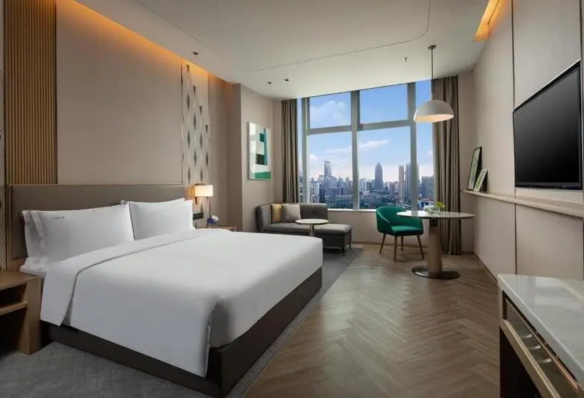 キングサイズベッドのスタンダードルーム, Holiday Inn Wuxi Central Station, An Ihg
