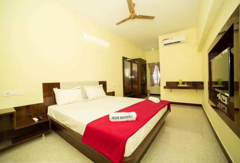 キングサイズベッドのデラックスルーム, Akash Residency