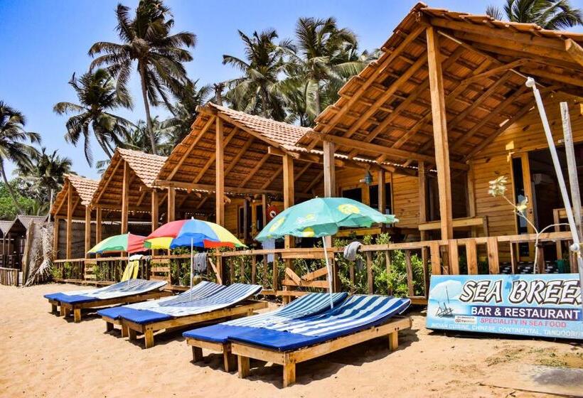 غرفة ديلوكس مطلّة علي البحر مزوَّدة بشُرفة, Om Sai Beach Huts