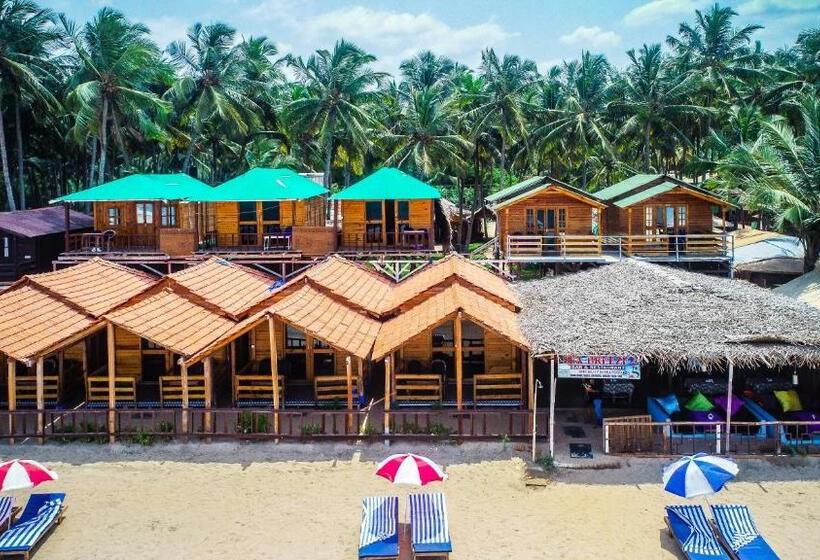 غرفة ديلوكس مطلّة علي البحر مزوَّدة بشُرفة, Om Sai Beach Huts