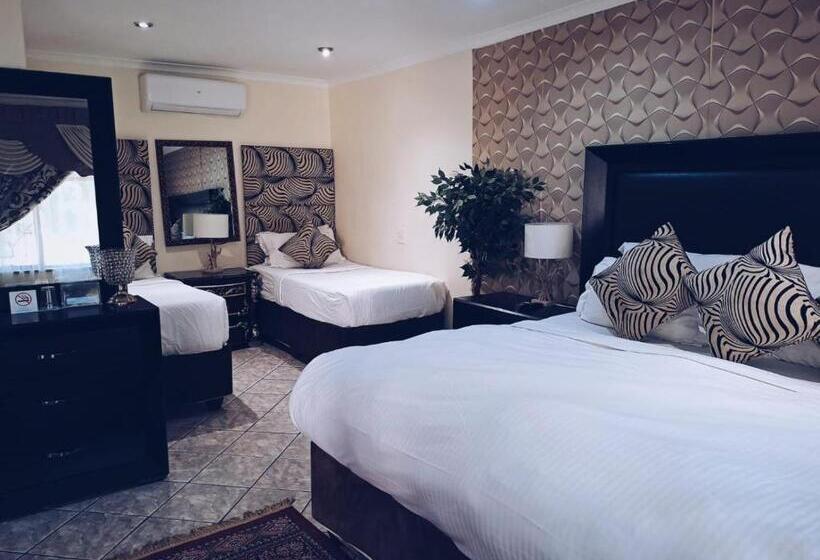 Quarto Quadruple Standart Vista Jardim, Ecotel Premier Lodge & Conference Centre