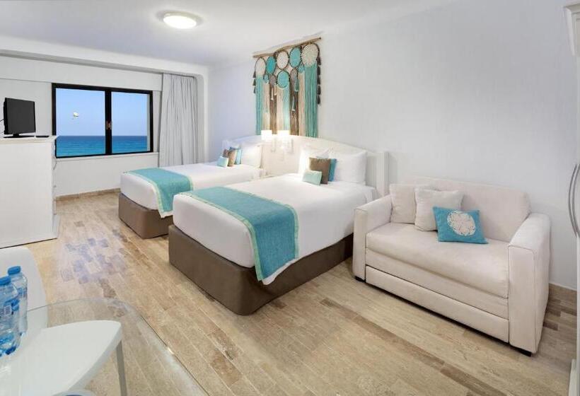 غرفة قياسية رباعية مطلة على البحر, Cyan Cancun Resort & Spa