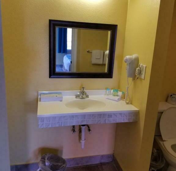 キングサイズベッドのデラックスルーム, Shining Light Inn & Suites