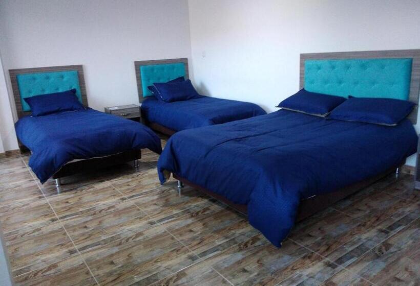 חדר לארבעה סטנדרטי עם מרפסת, Casa Bertha Hotel Y Servicios Sas