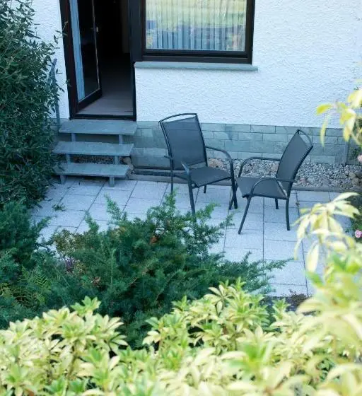 Quarto deluxe vista jardim, Gästehaus Cornelia