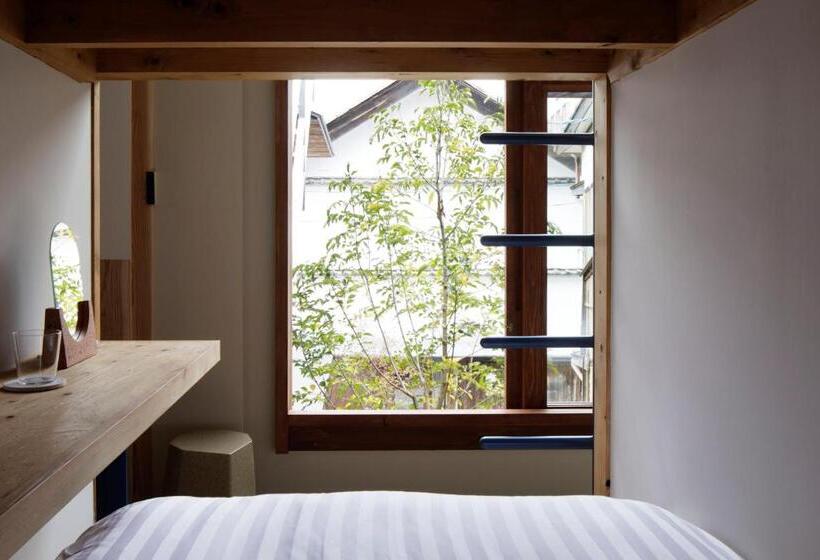 Llit en Habitació Compartida, Soil Setoda