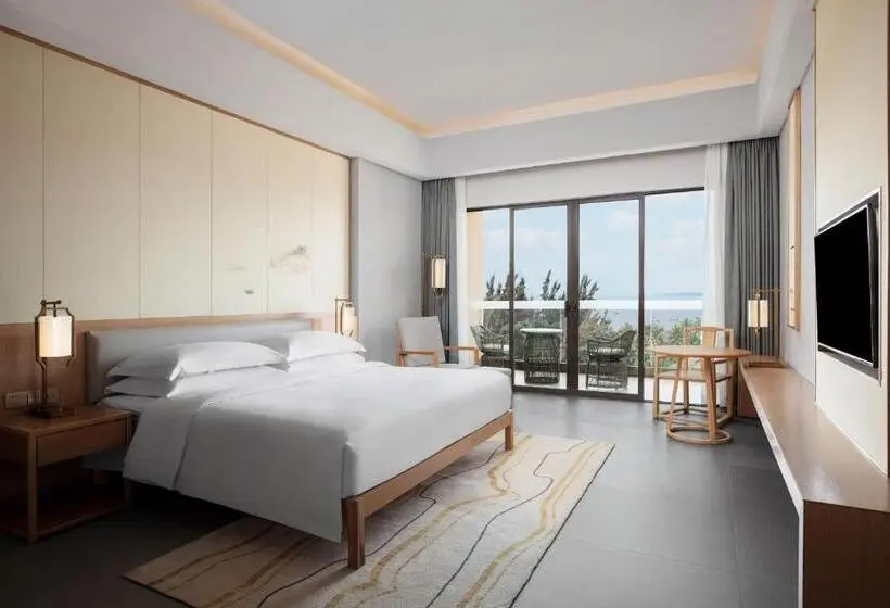 キングサイズベッドのスタンダードルーム, Sheraton Maoming Romantic Beach Resort