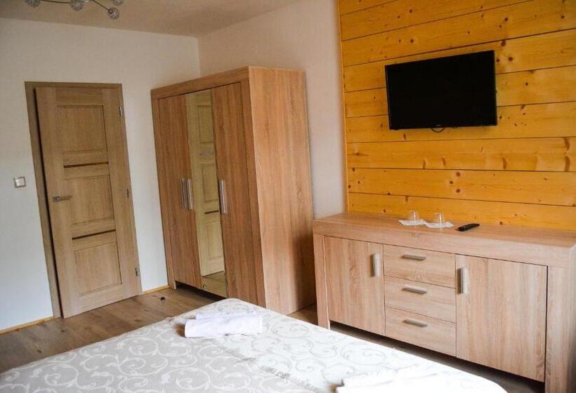 高级大房间, Krakonos