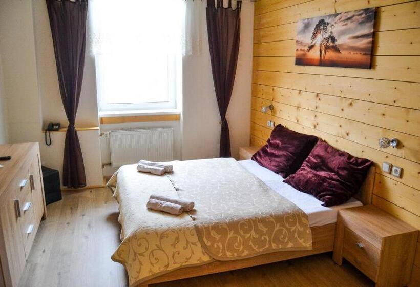 高级大房间, Krakonos