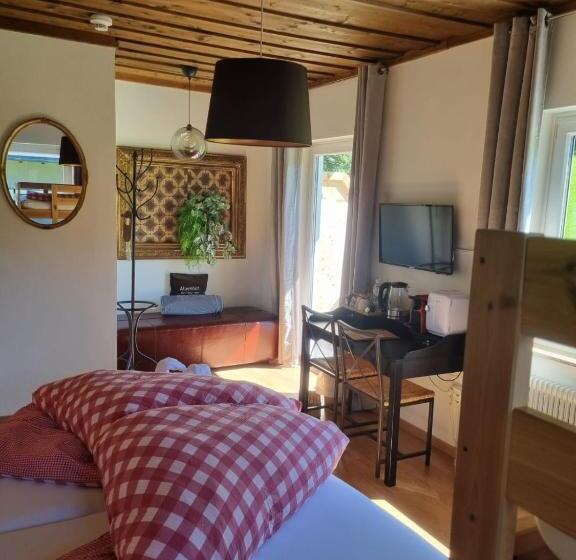 חדר דלוקס לארבעה, Boutique Hotel Alpenhof