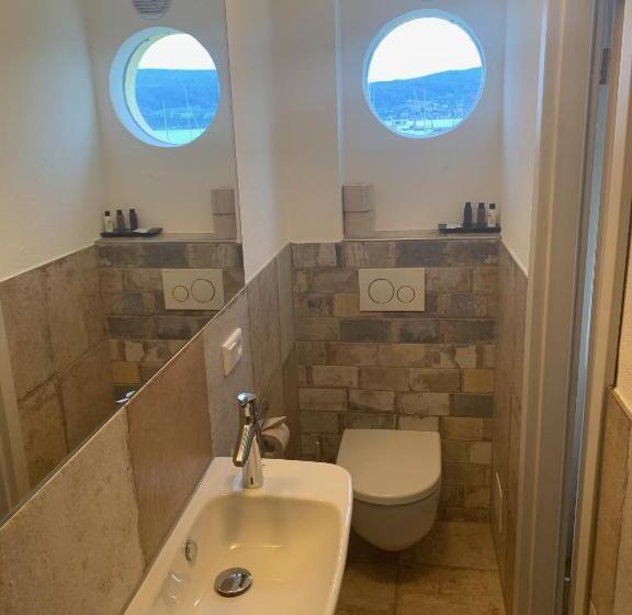 Quarto standart vista lago, Gästehaus Am See