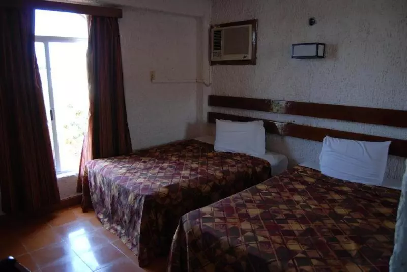 Standard Neljän Hengen Huone, Tankah Cancun
