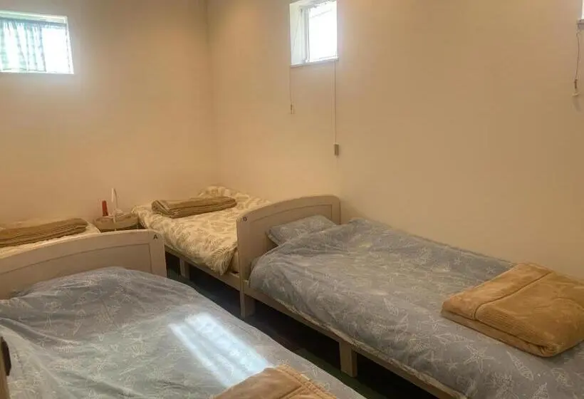 اتاق استاندارد چهارنفره با سرویس بهداشتی مشترک, B&b Surf Rider ゲストハウスタイプ