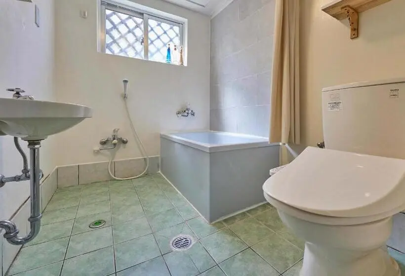 Huoneisto 1 Makuuhuone Terassi, Yukurina Resort Okinawa