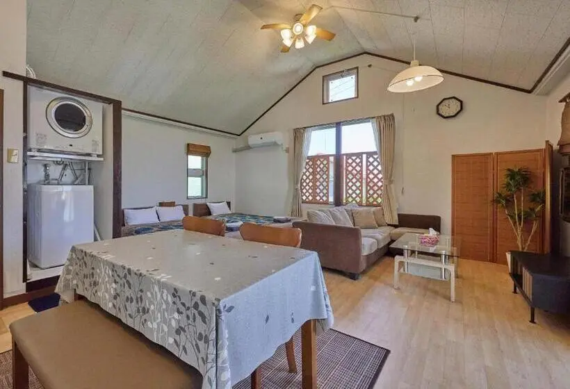 Huoneisto 1 Makuuhuone Merinäkymä, Yukurina Resort Okinawa