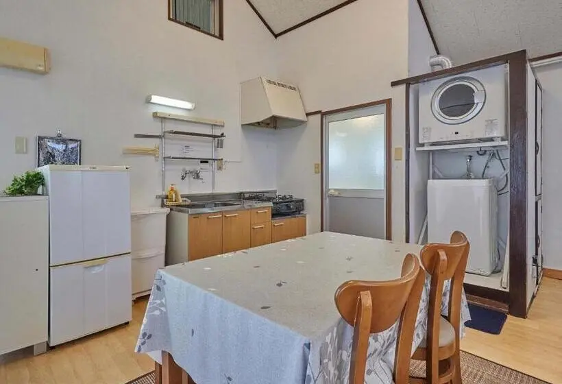 Huoneisto 1 Makuuhuone Merinäkymä, Yukurina Resort Okinawa