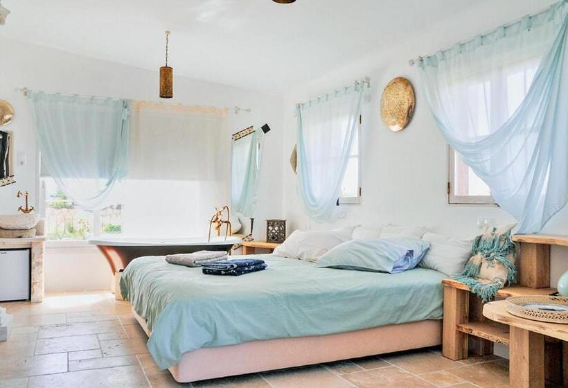 オーシャンビュースーペリアースイート, Uma Casa A Beira Sol