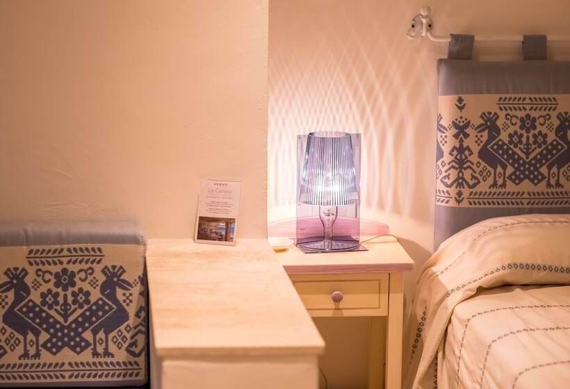 غرفة عائلية, Ollastu