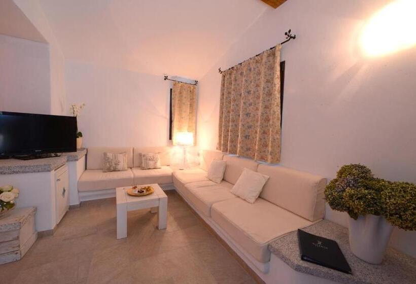 جناح جونيور عائلى, Ollastu